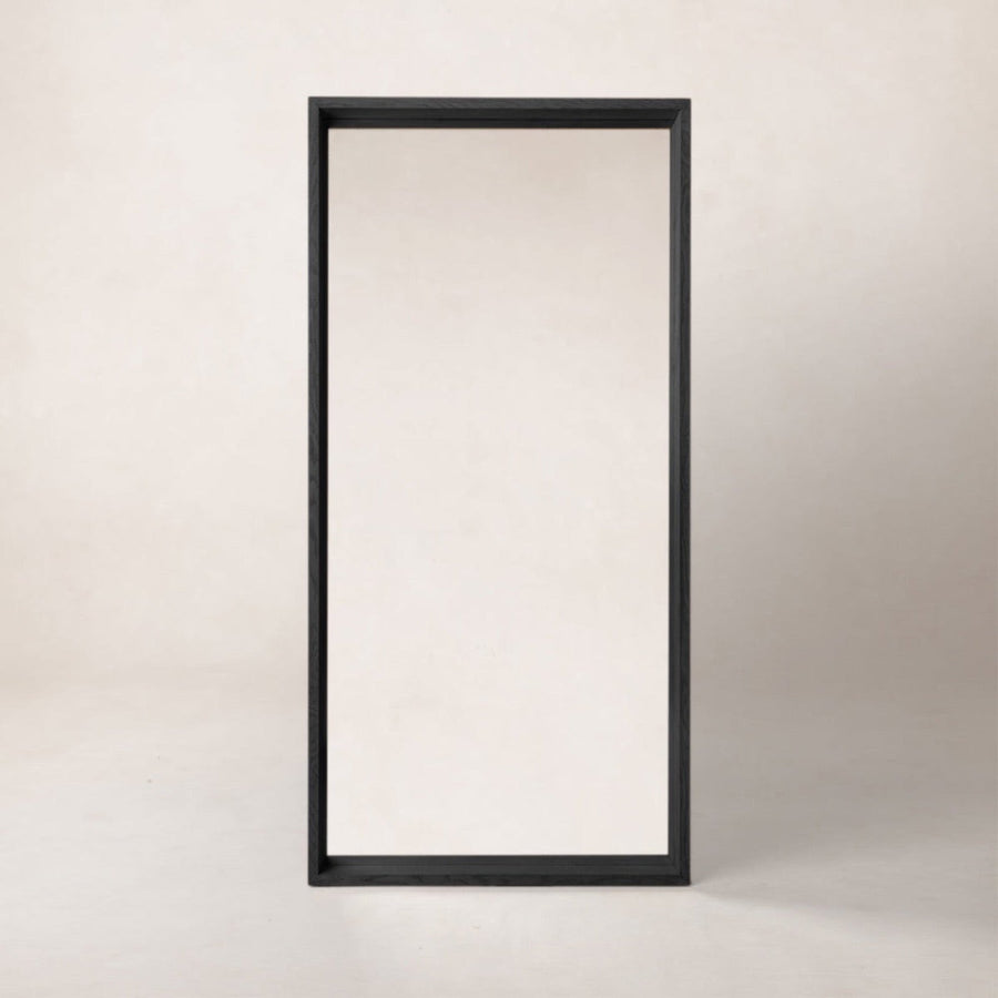 extra large floor leaning mirror with a charcoal wood frame 